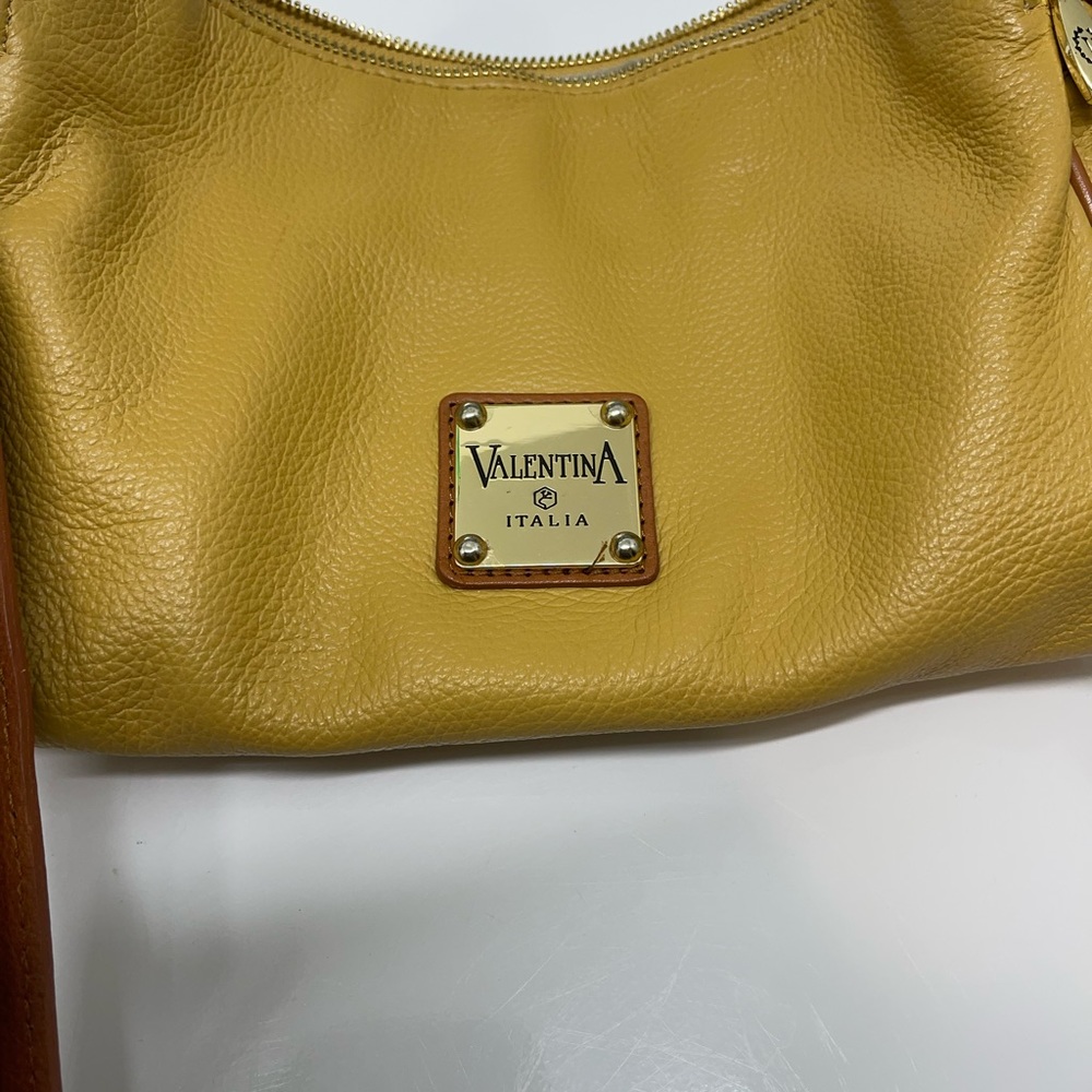 Valentina yellow leather messenger bag.